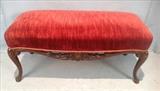 218  - Mahogany fireside bench with carved front and red antique upholstery, 19 in. T, 41 in. w, 19 in. D.