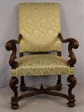 221  - Mahogany fireside chair with unusual arms, tight stretcher  and lime green upholstery, 43 in. t, 29 in. W, 25 in. D.
