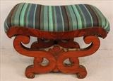 263 - Flame mahogany empire footed stool with new green stripe upholstery, 16 in. T, 25 in. W.