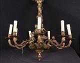 304  - Brass light fixture with cupids and 9 arms, 27 in. T.