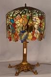 214 - Extremely large brass lamp with leaded glass shade, 32 in. T, 18 in. w.