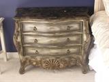 Pair of custom made bedroom side chests with marbleized tops.