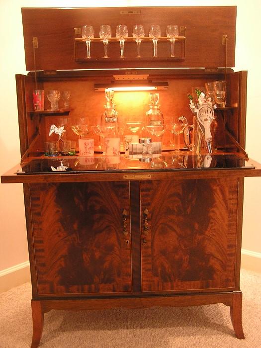1930s English Drop Front bar with original key, Bird's Eye Maple interior, original interior mirror, and original key. All in near perfect condition.