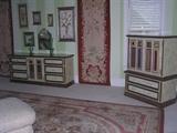 Selling this "Breckenridge Collection" McKenzie Childs inspired painted bedroom set. It includes a dresser, mirrors, chest, side table and headboard. We also have many carpets and throw rugs available.