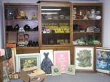 This bookcase and everything around and on it is for sale. Purses (some new), shoes and boots size 7, Invicta watches, boxes of jewelry, paintings and miscellaneous knick-knacks are all for sale.