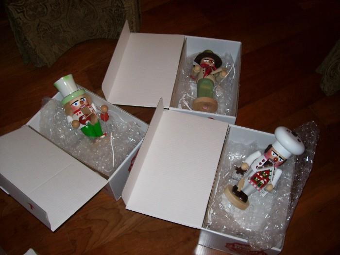 At least 10 collectible German nutcrackers still in the boxes.