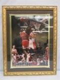 Autographed Dikembe Mutombo blocking Michael Jordan Photograph taken by Scott Cummingham