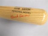 Autographed Hank Aaron baseball bat.