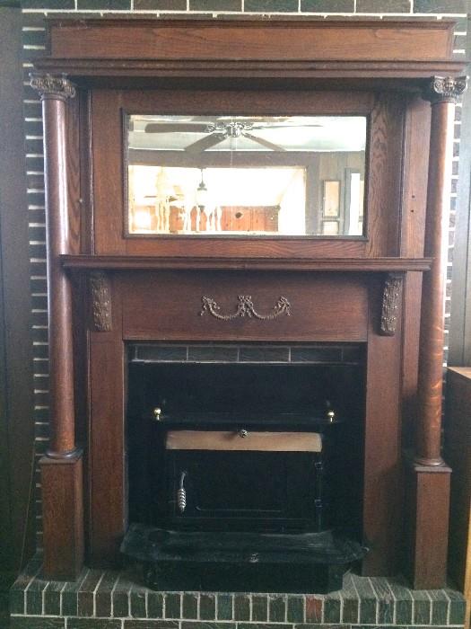 Fireplace mantle and surround with bevelled mirror--lovely condition; owner has placed a reserve on this item. It is $1,500 firm.