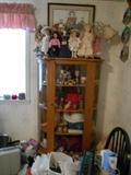 Another curio cabinet full.  Note round glass door