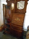 Secretary and curio with curved glass