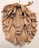Corn husk mask by Mary E. Sandy.