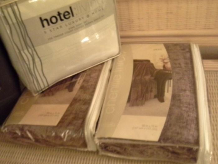 New in package throws and King size sheet set