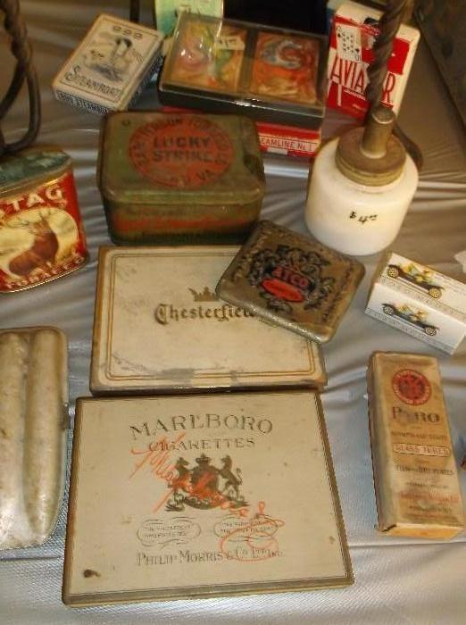 Stag, Lucky Strike, Chesterfield, Atco, and Marlboro cigarette tins