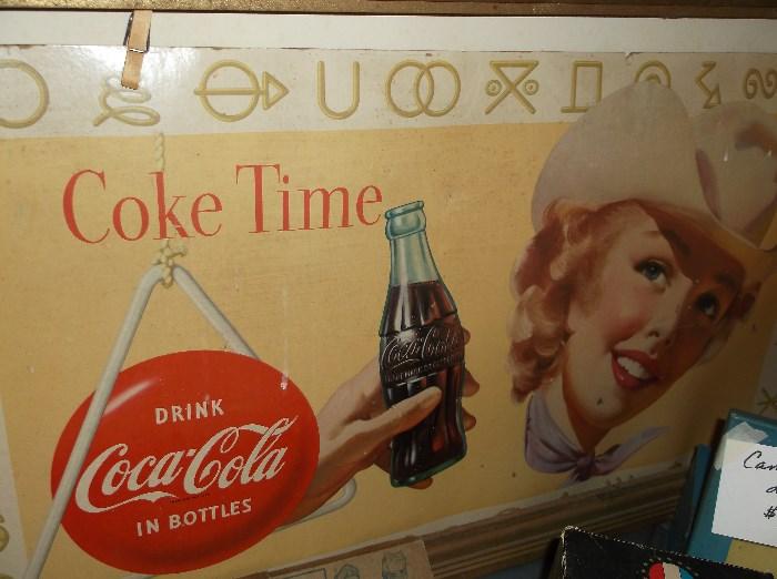 1955 Coca-Cola cowgirl cardboard sign