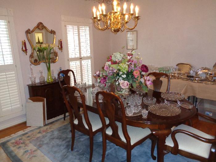 Ethan Allen Cherry dining table, 6 chairs, 2 leaves and table pads