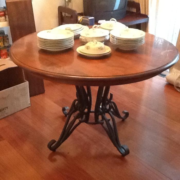 46" round Stickley IRON & wood table, has two leaves to make large oval table, Originally $2799 at Stickley,