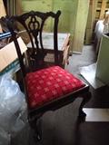 This Chippendale style side chair is part of a dinning room set.