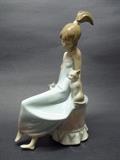 Llardo figurine of a girl sitting with a cat