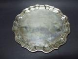 Sterling silver salver (serving tray with no handles) with a scrolled border Chippendale Style made by Reed & Barton