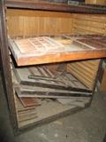 The other cabinet turned around with loose drawers and inserts