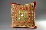 One of several antique embroidered fabrics that have been turned into pillows for sale