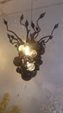 Hand Made, mouth blown, chandelier, black and clear ball glass Estimate. 60" X 48"