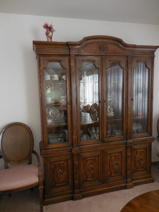 Drexel Heritage Breakfront. All Three Sides are lighted.With Glass Shelves, Storage, Linen Drawers