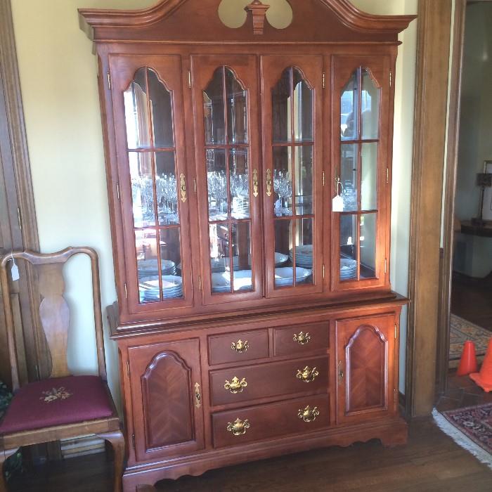    Lovely Drexel china cabinet with Waterford crystal; one of 3 matching needlepoint chairs (to left)