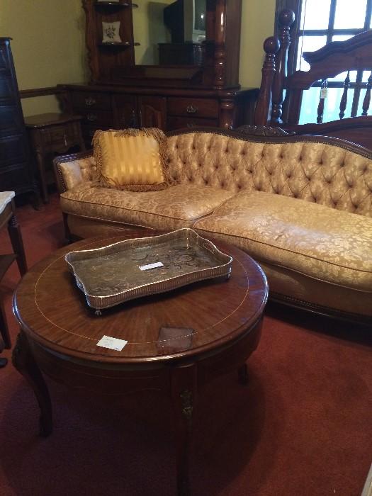 Another gold antique sofa; round table; king bed & matching dresser (in back)