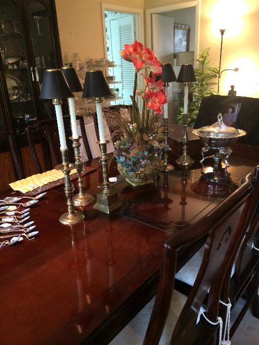    Exceptional Henredon dining table with 8 chairs with matching china cabinet