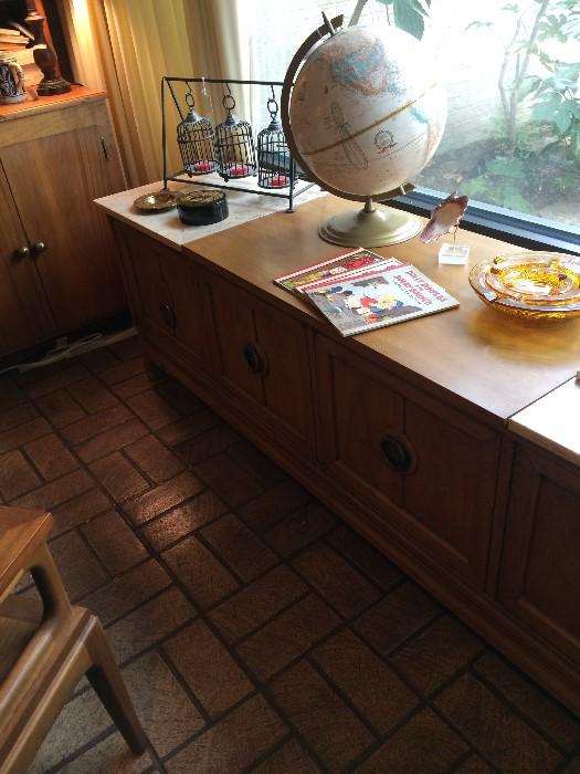 Modern style credenza; world globe