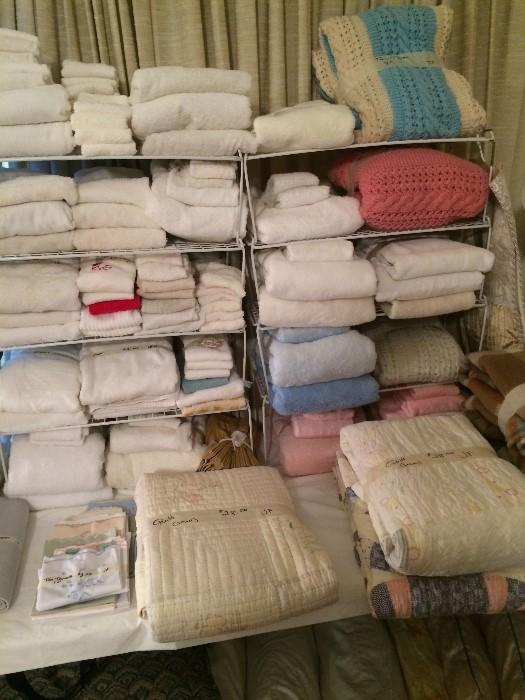 Huge array of blankets, pillow, & towels