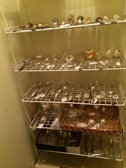 Large variety of sterling & silver plate serving utensils