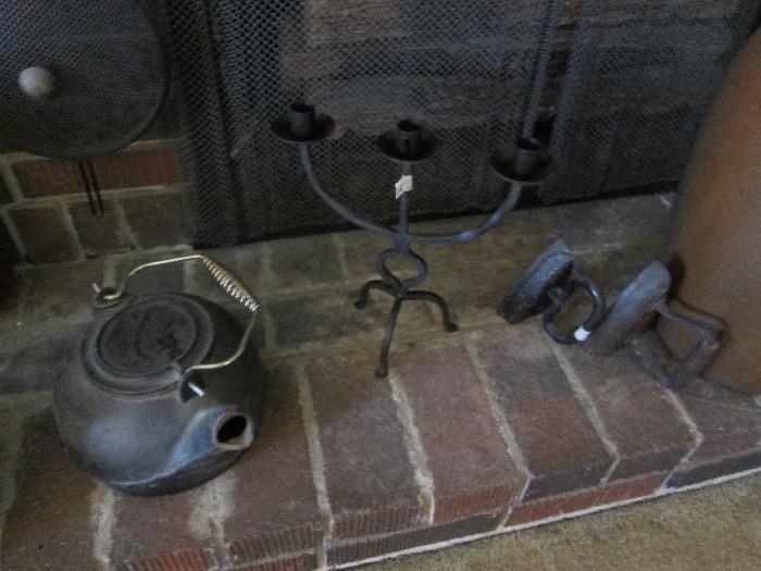 Cast iron kettle, candle stick, sad irons