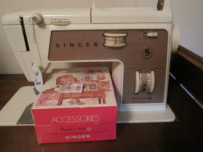 Vintage Singer "Touch & Sew" machine in cabinet with matching sewing chair