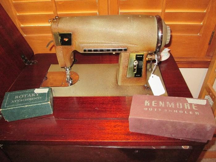 Vintage Kenmore sewing machine in cabinet