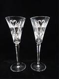 PAIR WATERFORD CRYSTAL CHAMPAGNE FLUTES WITH ETCHED SWANS IN THE FORM OF HEARTS