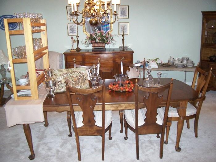 Classic home full of nice items - great dining room set - table with leaves and six chairs.