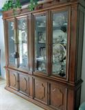 Super quality Drexel Heritage dining set: lighted china cabinet, large table with three leaves and eight chairs (two arm), and a side server. This set is available for early purchase for $2800.