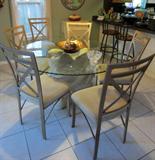 Dolphin base glass table and six chairs
