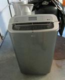 Portable room air conditioner with sufficient capacity to cool a garage.  Used twice!