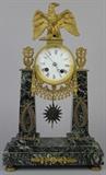 http://www.invaluable.com/auction-lot/empire-style-gilt-metal-mounted-green-marble-mant-1024-c-f2d439abc1 Empire Style Gilt Metal Mounted Marble Mantel Clock