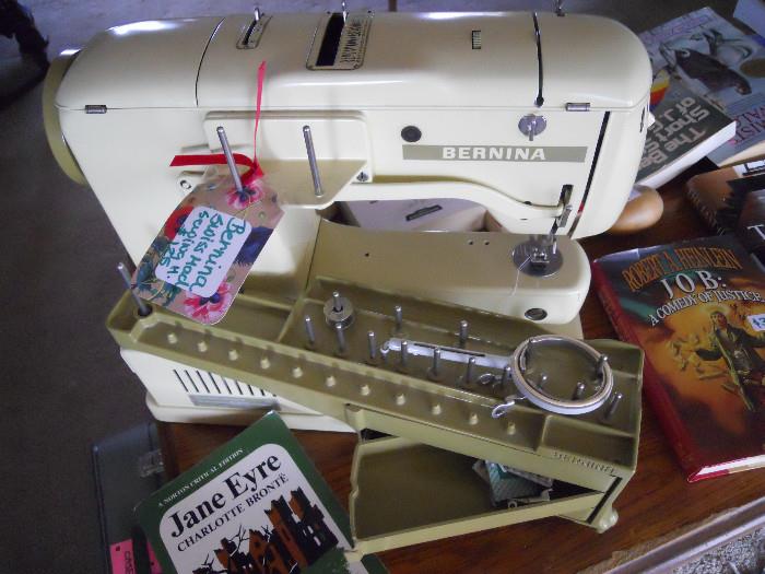 Close up Swiss Berninia Sewing machine with attachments and case