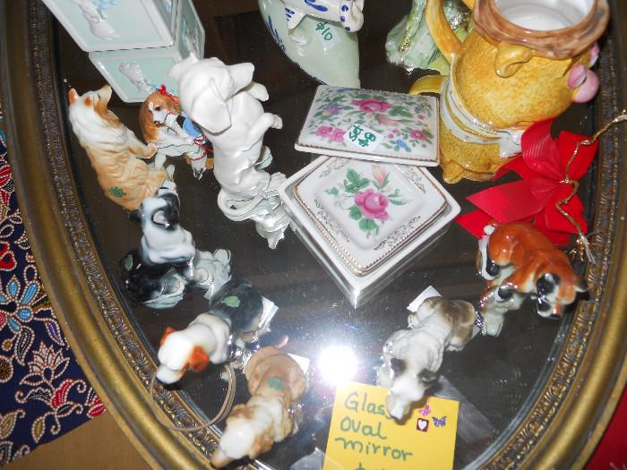 Glass Oval Mirror and Decorative Miniature Dogs Collections and Collectable items