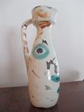 Picasso's, "Un Pichet Droit Visage", ceramic vase.              11 1/2" x 4".  Numbered 220 of 500.  