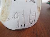 Picasso's, "Un Pichet Droit Visage", ceramic vase.              11 1/2" x 4".  Numbered 220 of 500. 