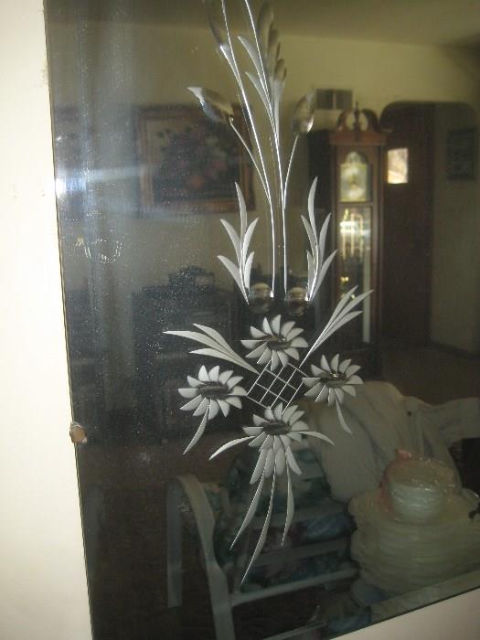 Huge Etched Mirror on the Living Room Wall.