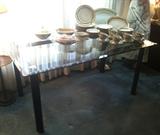 GLASS TOP DINING TABLE WITH METAL BASE