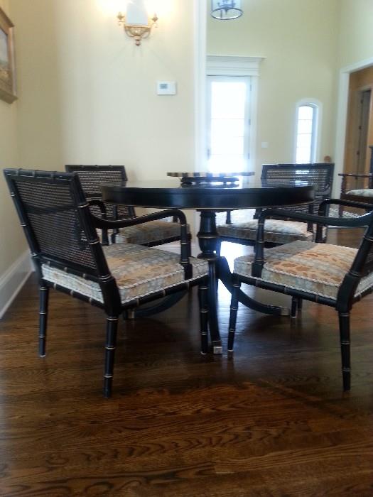Regency style ebonized game set with table and four chairs